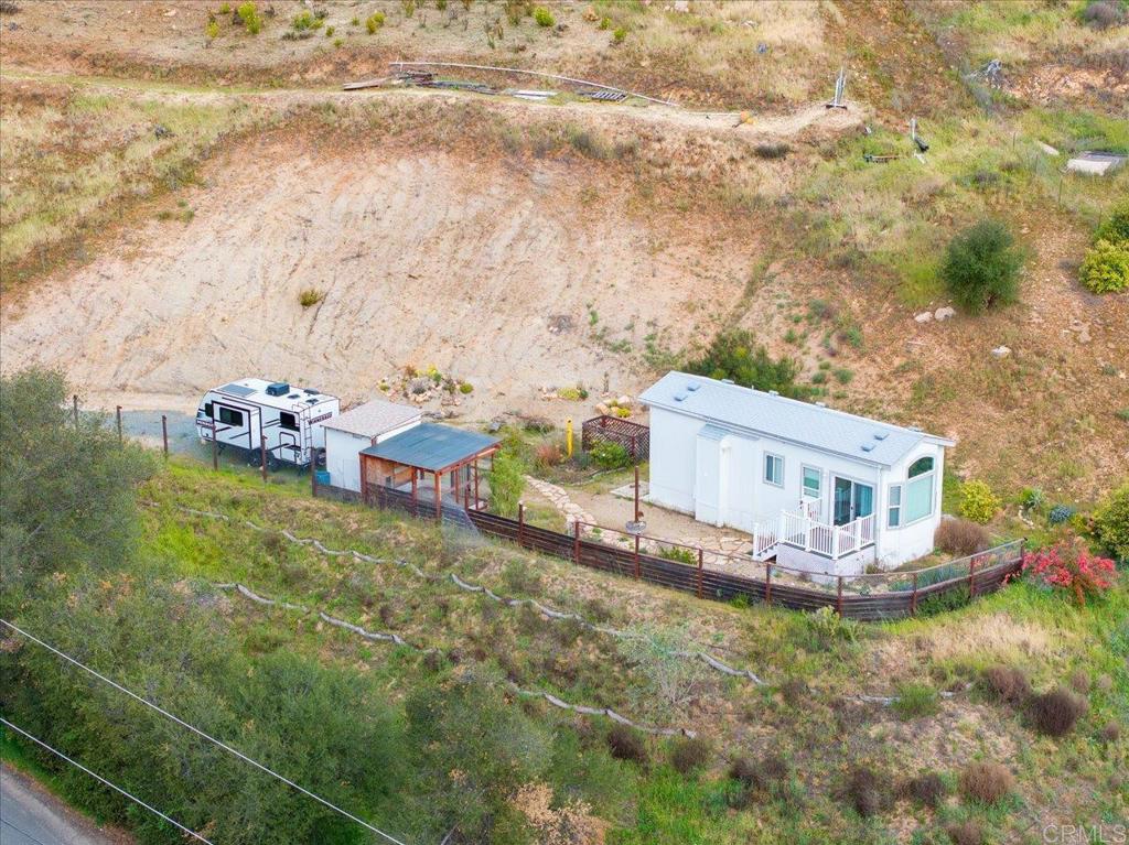 32460 Lilac Road Valley Center, CA 92082 - Photo 28 of 45 a front view of a house with a yard