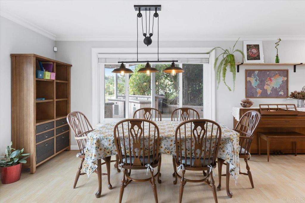 32460 Lilac Road Valley Center, CA 92082 - Photo 7 of 45 a view of a dining room with furniture window and outside view