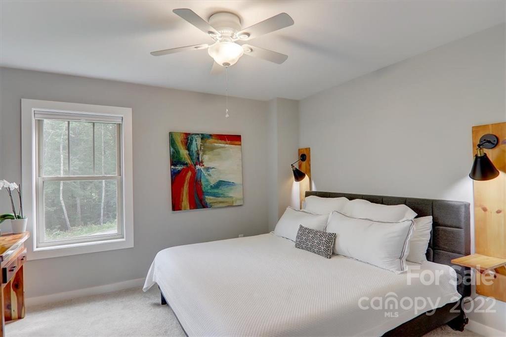 11 Ridge Brook Drive Weaverville, NC 28787 - Photo 25 of 38 a bedroom with a bed and a window