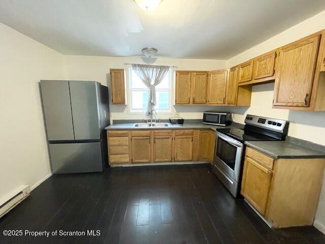 611 South Webster Avenue, Unit 1 Scranton, PA 18505 - Photo 2 of 9 a kitchen with a cabinets a sink a window and stainless steel appliances