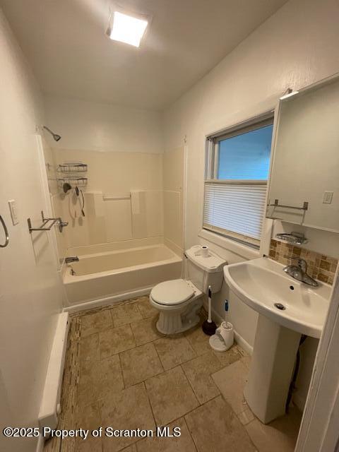 611 South Webster Avenue, Unit 1 Scranton, PA 18505 - Photo 4 of 9 a bathroom with a sink a toilet and shower