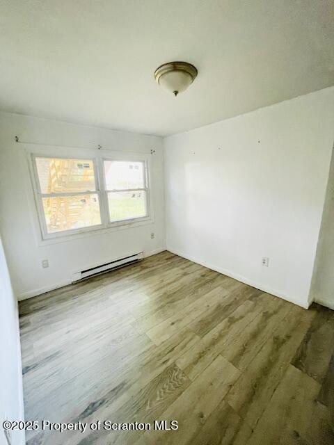 611 South Webster Avenue, Unit 1 Scranton, PA 18505 - Photo 9 of 9 an empty room with wooden floor and windows