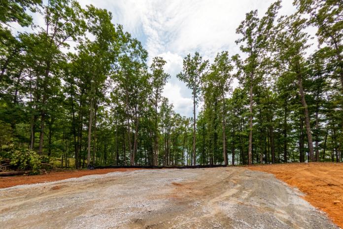 4 Warpath Ridge Trail Six Mile, SC 29682 - Photo 7 of 16 A spacious, cleared lot offers generous building potential amidst mature trees and lake views.