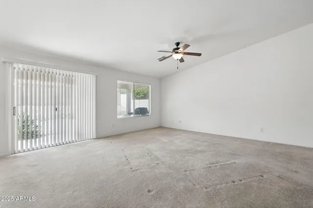 a kitchen with granite countertop a stove and a sink