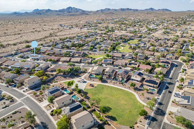 an aerial view of a building with beach