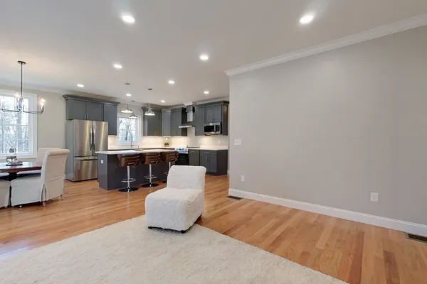 a kitchen with a sink stainless steel appliances and cabinets