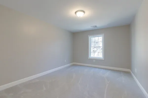 an empty room with a window
