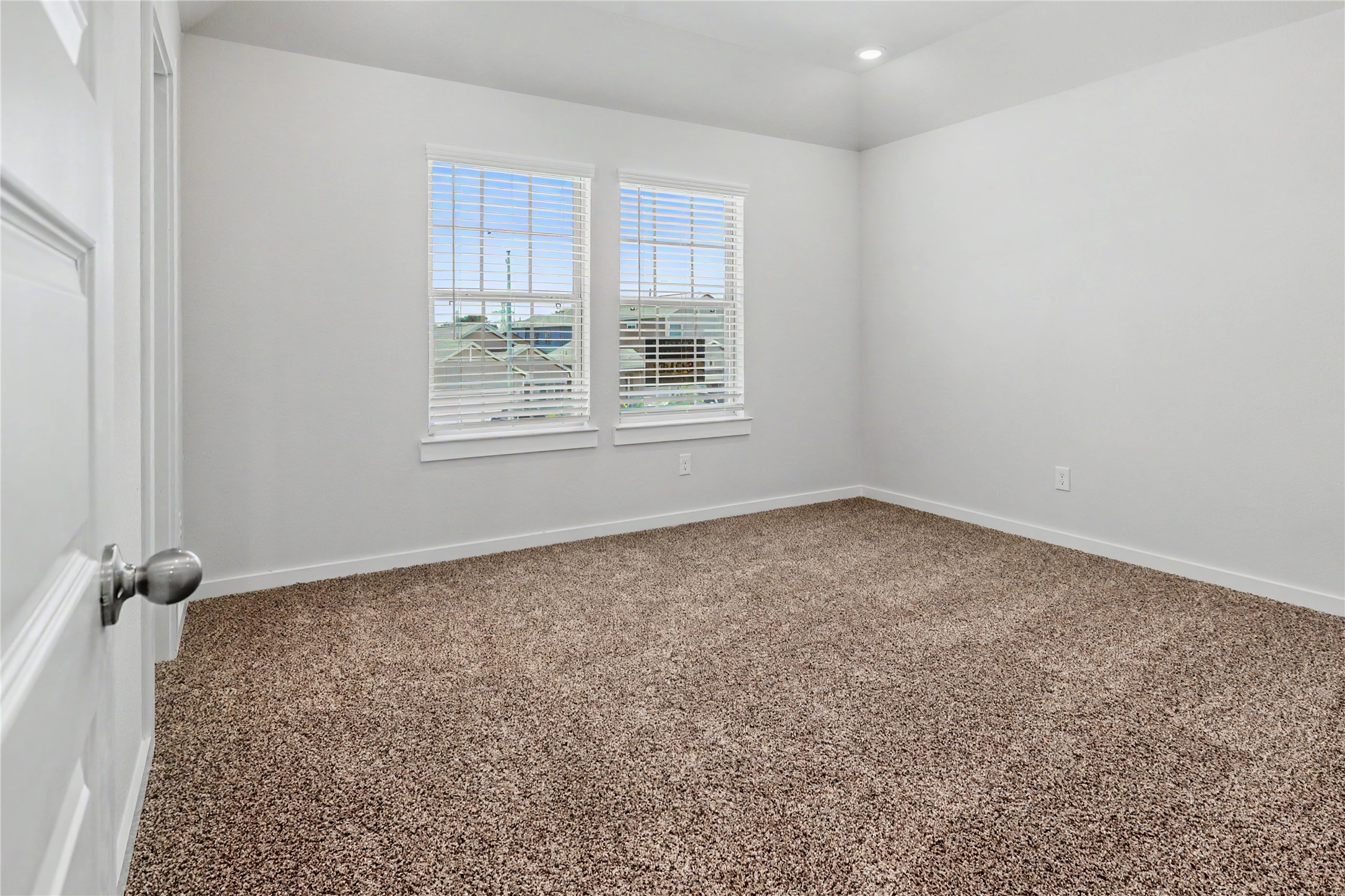 6427 Bolinas Court Rosharon, TX 77583 - Photo 31 of 49 an empty room with a empty space and windows