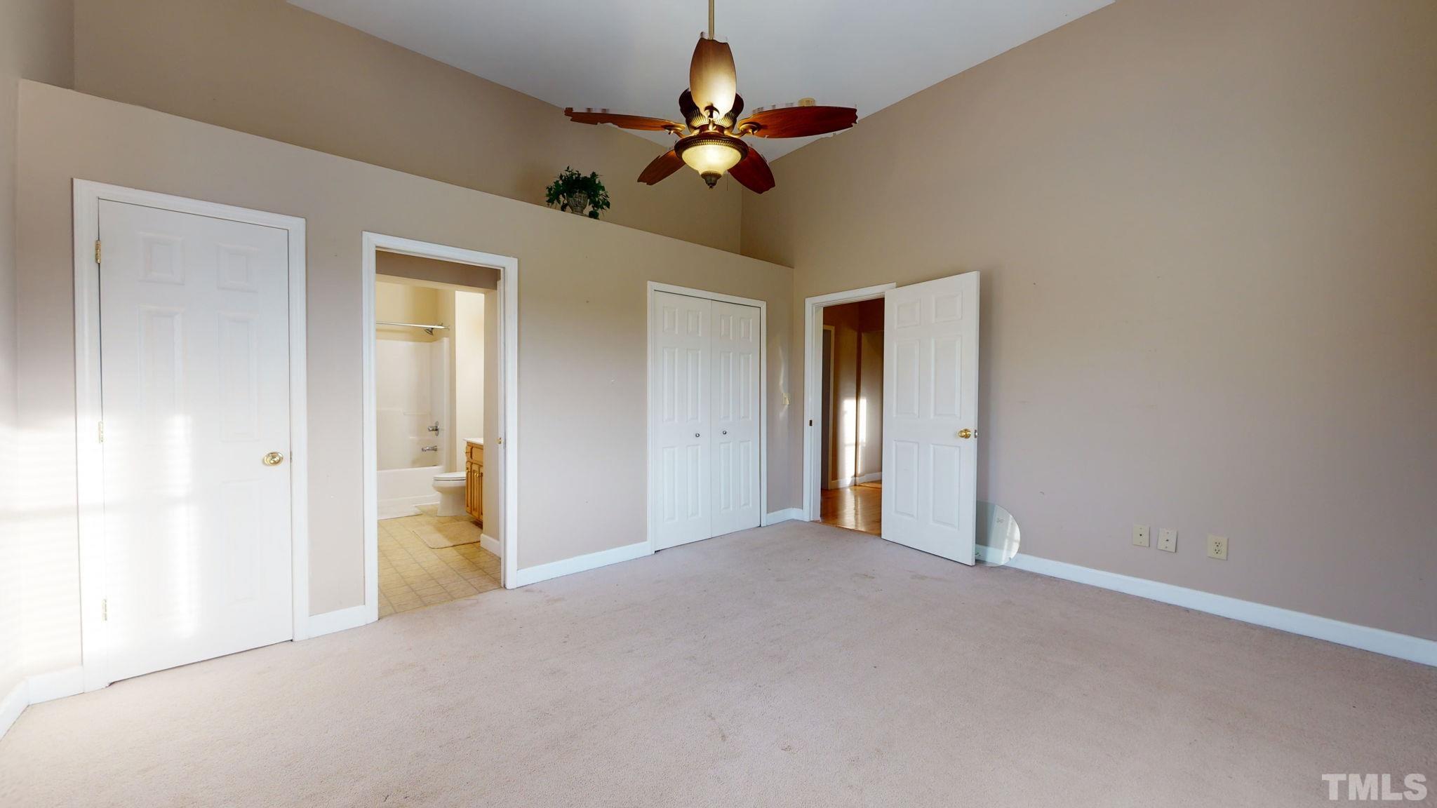 720 Mitchell Road Angier, NC 27501 - Photo 20 of 25 a view of an empty room and chandelier fan