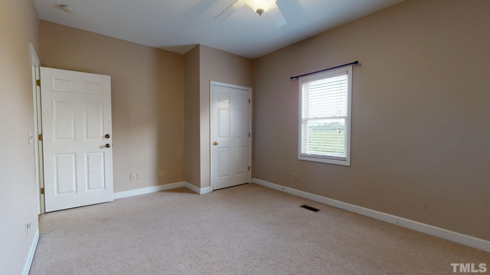 720 Mitchell Road Angier, NC 27501 - Photo 25 of 25 an empty room with a window