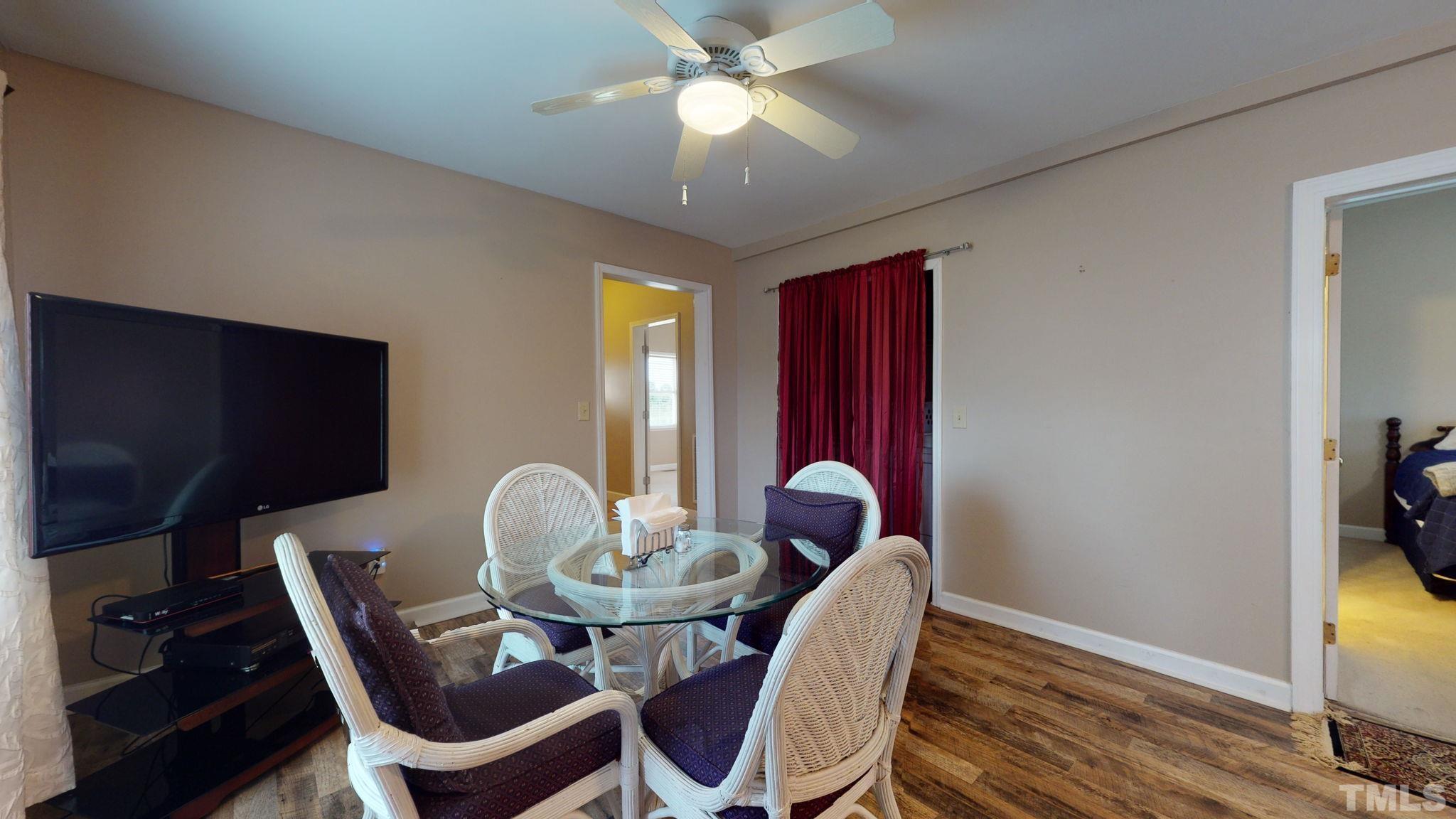 720 Mitchell Road Angier, NC 27501 - Photo 9 of 25 a dining room with furniture and window