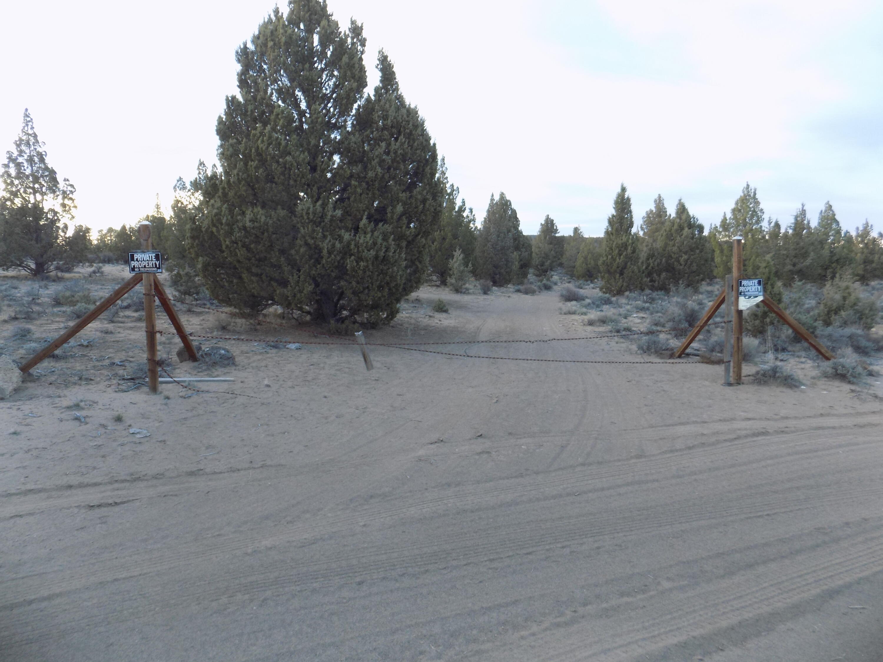 1400 Golden View Ranch Bend Bend, OR 97701 - Photo 7 of 13 fenced, gated entrance to lot 1400.