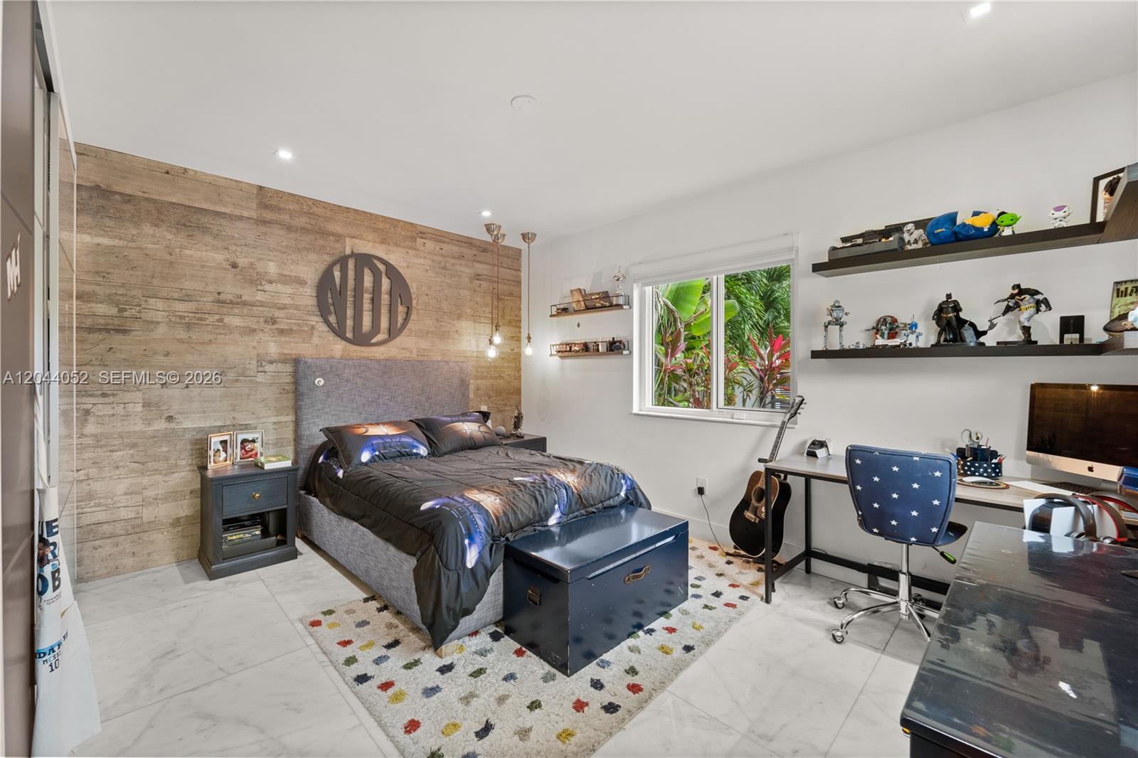 721 Bird Road Coral Gables, FL 33146 - Photo 13 of 24 a bedroom with a bed and a window