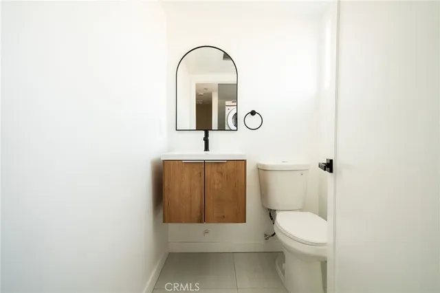 a bathroom with a toilet and a sink