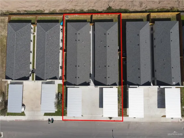 an aerial view of residential house with parking space