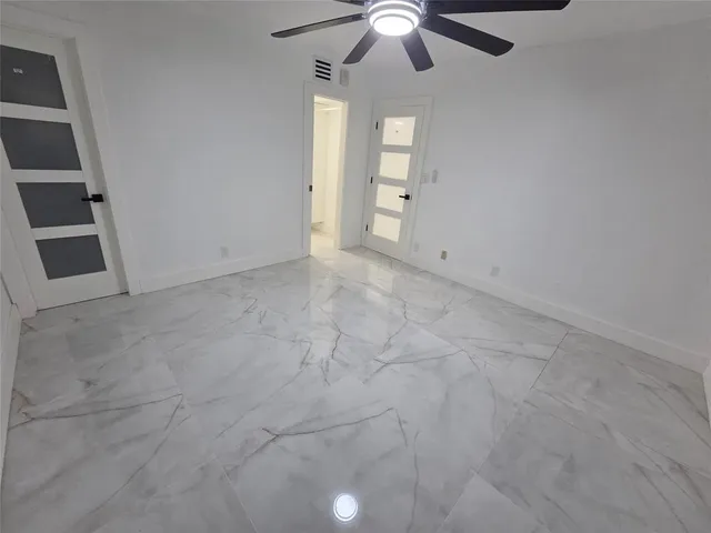 a room with furniture and window