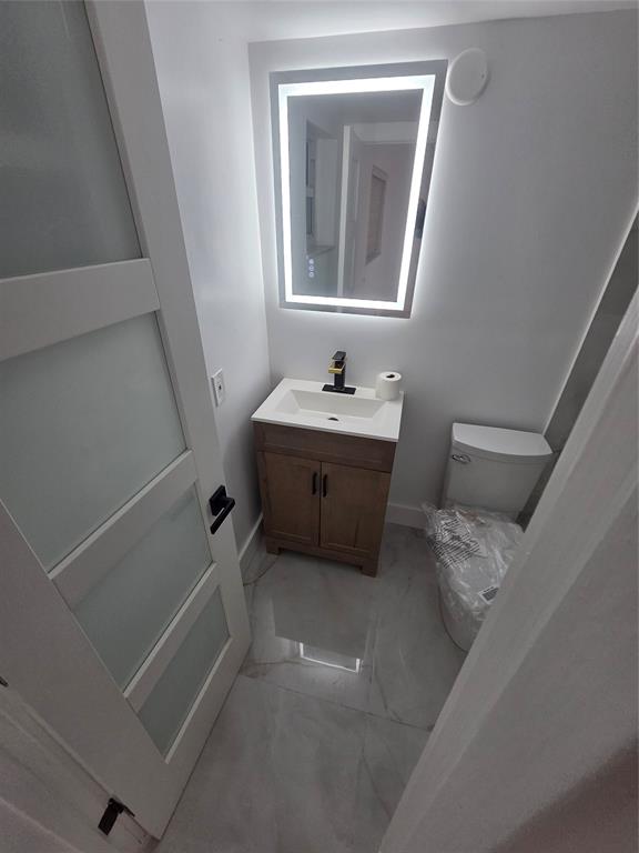 251 South Cypress Road, Unit 101 Pompano Beach, FL 33060 - Photo 19 of 41 a room with furniture and window