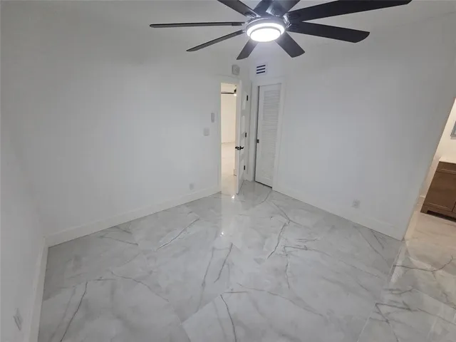 a bathroom with a sink toilet and tub