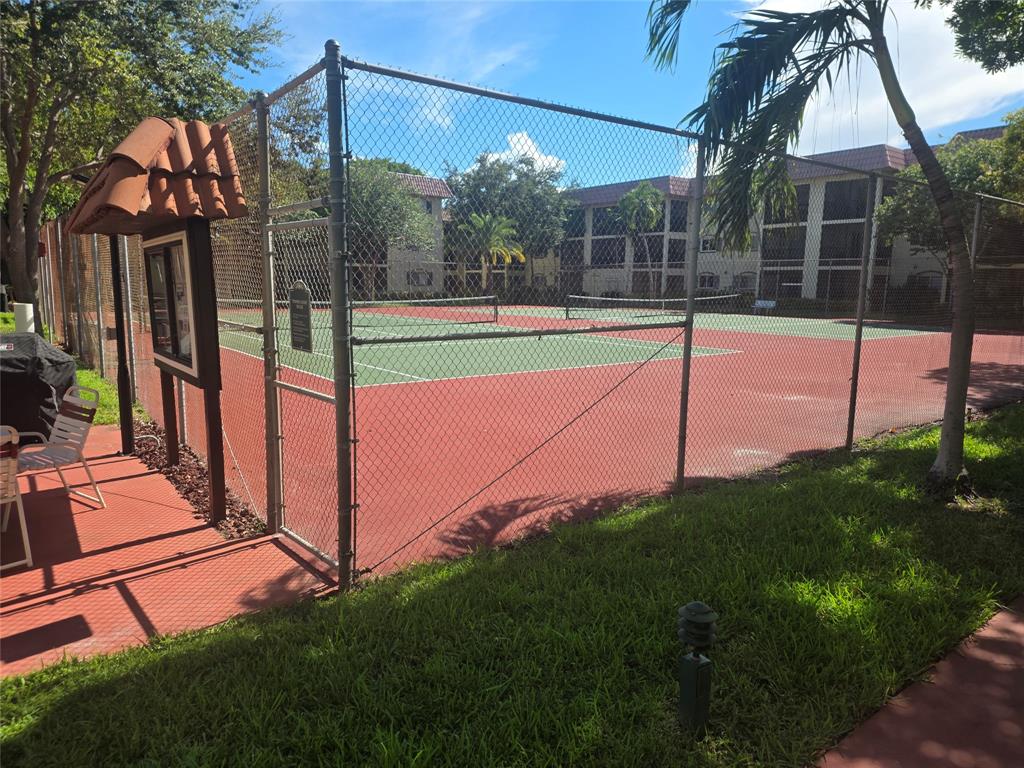 251 South Cypress Road, Unit 101 Pompano Beach, FL 33060 - Photo 33 of 41 a view of a backyard