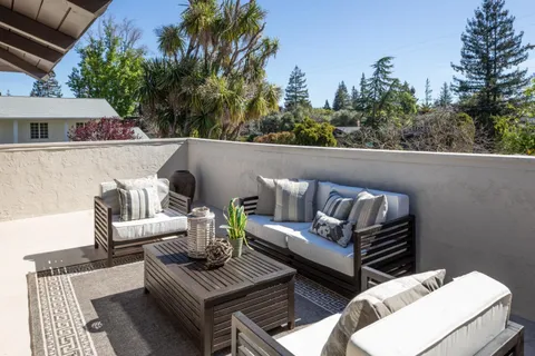 a view of a patio on the roof deck