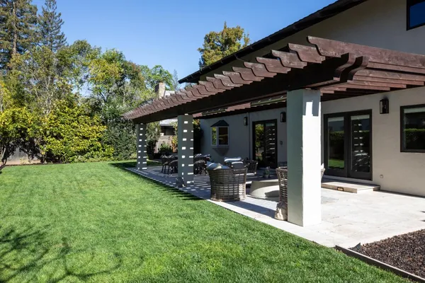 a view of a backyard of a house