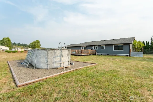 a view of a house with a swimming pool