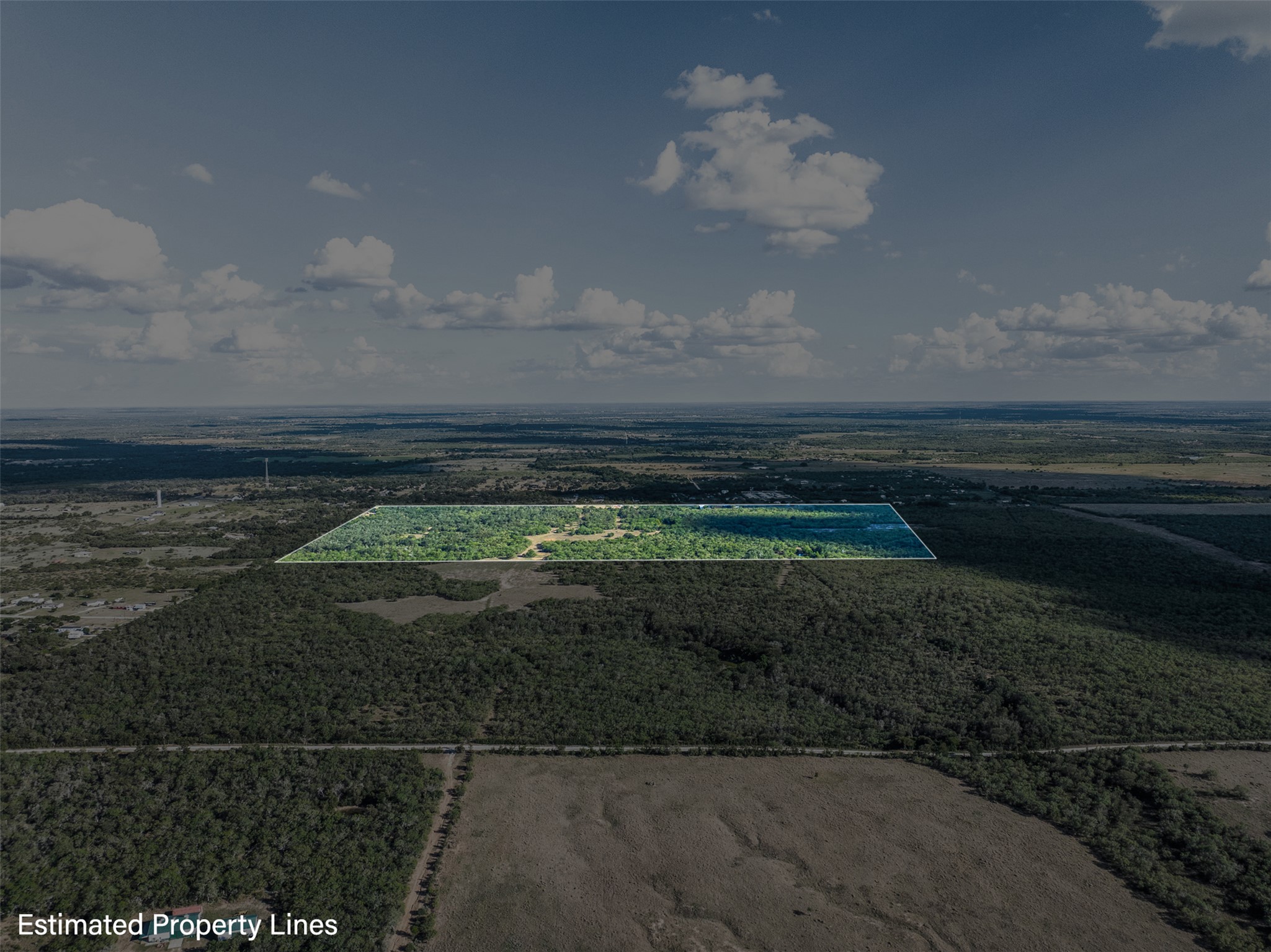 399 Seals Creek Road Lockhart, TX 78644 - Photo 34 of 40 Aerial view of property and surrounding area featuring property boundaries highlighted and a forest