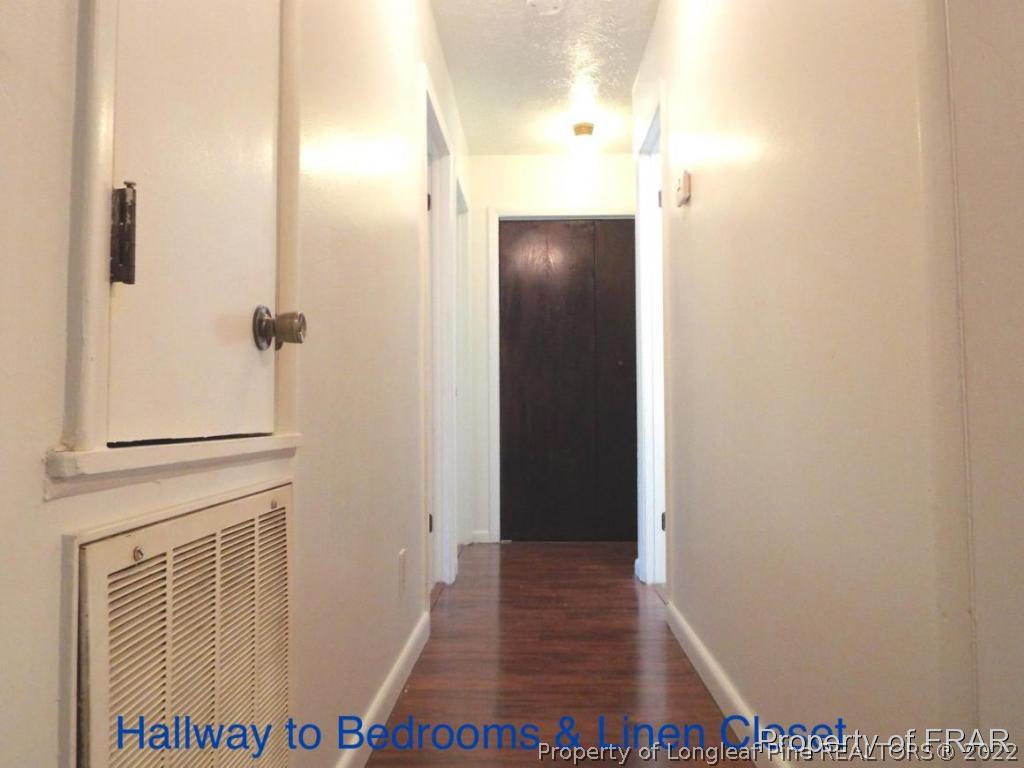 3307 Arrowhead Road Spring Lake, NC 28390 - Photo 7 of 15 hallway with wooden floor