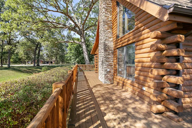 a view of outdoor space with garden and deck