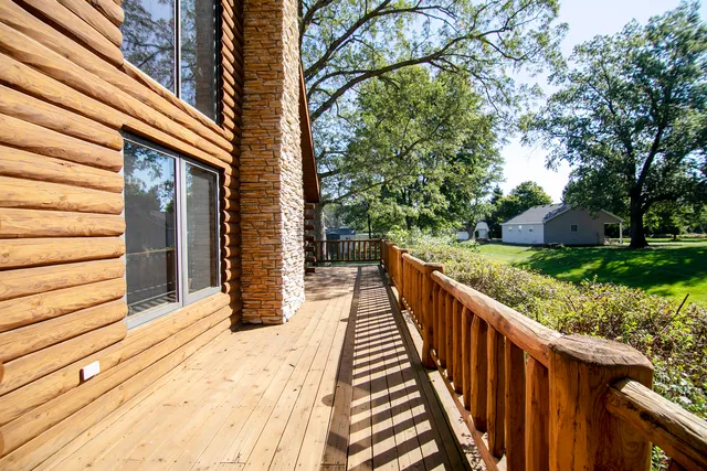 a balcony with view of trees