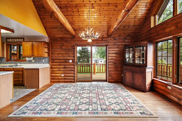 a kitchen with a sink and a stove top oven