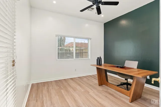 a room with furniture and wooden floor