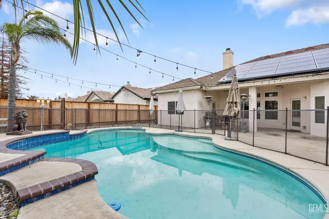 a view of outdoor space with garden and trees