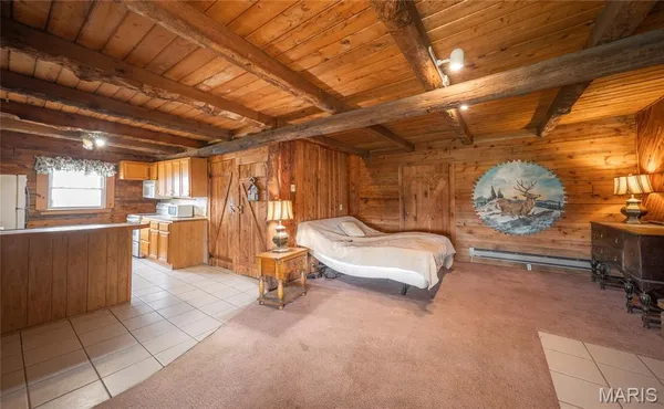 $297,500 | 21303 Teardrop Road, Devils Elbow, MO 65457