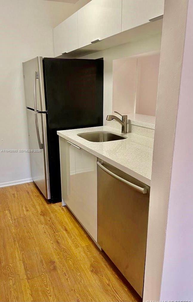 4421 West McNab Road, Unit 20 Pompano Beach, FL 33069 - Photo 5 of 14 a utility room with washer and dryer
