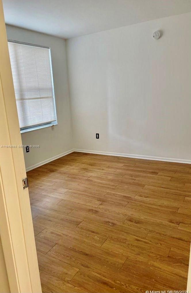 4421 West McNab Road, Unit 20 Pompano Beach, FL 33069 - Photo 9 of 14 a view of room and window