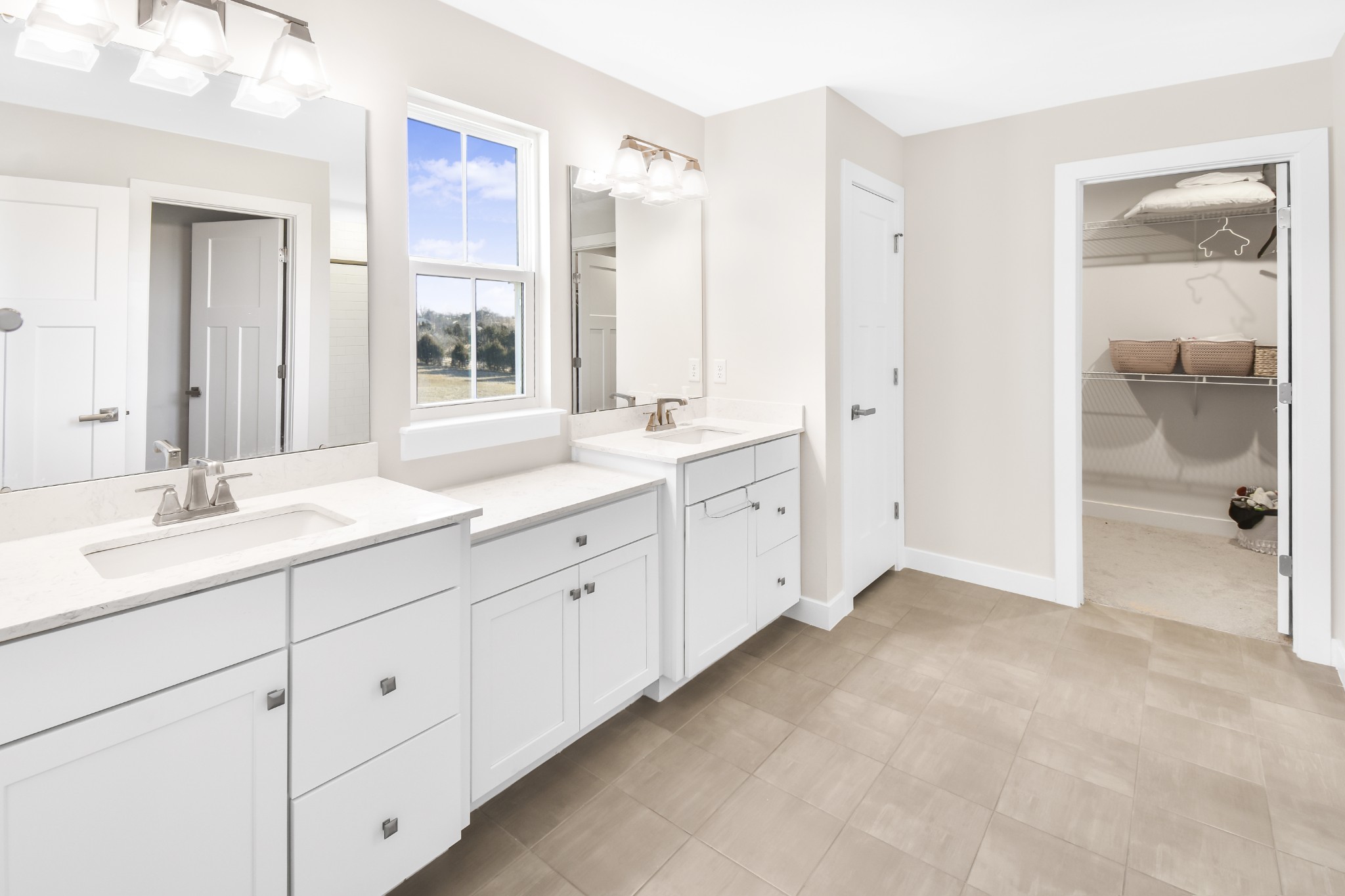 308 Collier Road Mount Juliet, TN 37122 - Photo 19 of 36 a spacious bathroom with double sink and a large mirror