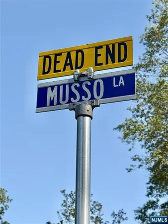 a street sign that is on a pole