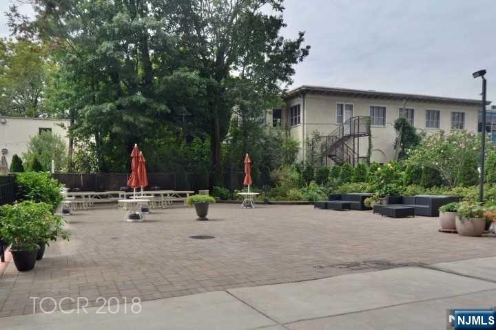 285 Aycrigg Avenue, Unit 22C Passaic, NJ 07055 - Photo 3 of 14 a view of outdoor space and yard