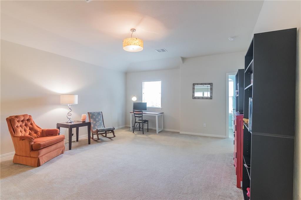 252 Pond View Pass Buda, TX 78610 - Photo 17 of 37 a view of a livingroom with furniture and a window