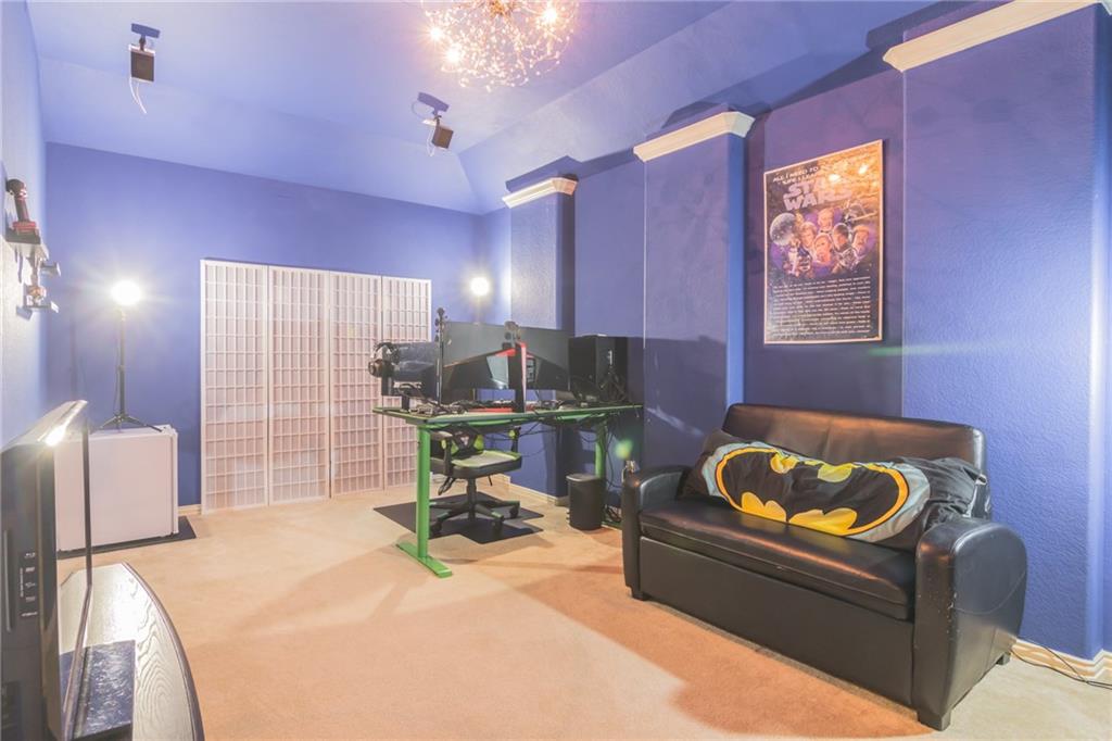 252 Pond View Pass Buda, TX 78610 - Photo 22 of 37 a living room with furniture and a table