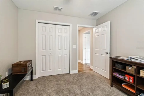 a view of a livingroom with furniture