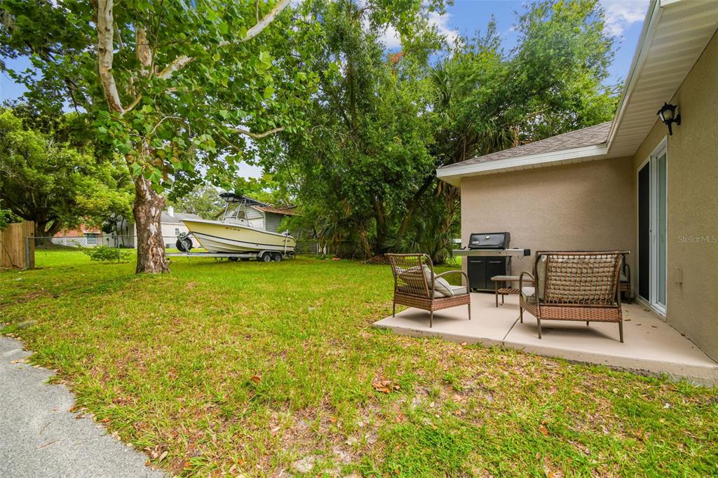 524 Carroll Avenue Lakeland, FL 33815 - Photo 29 of 33 a view of a two chairs in a patio