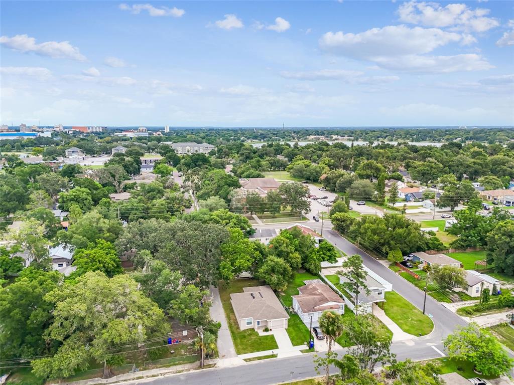 524 Carroll Avenue Lakeland, FL 33815 - Photo 32 of 33 an aerial view of residential building with green space