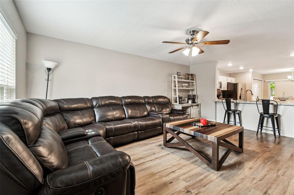 524 Carroll Avenue Lakeland, FL 33815 - Photo 5 of 33 a living room with furniture and kitchen view