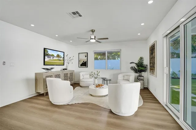 a bedroom with a bed and a table