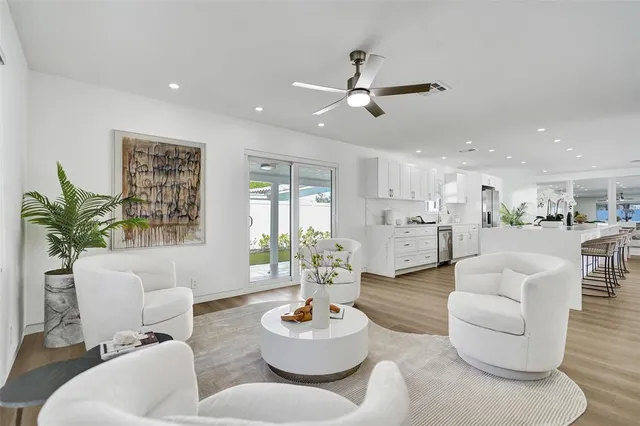 a bathroom with a shower sink and mirror