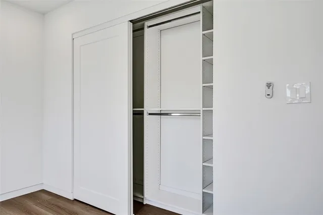 a view of a house with a yard porch and furniture