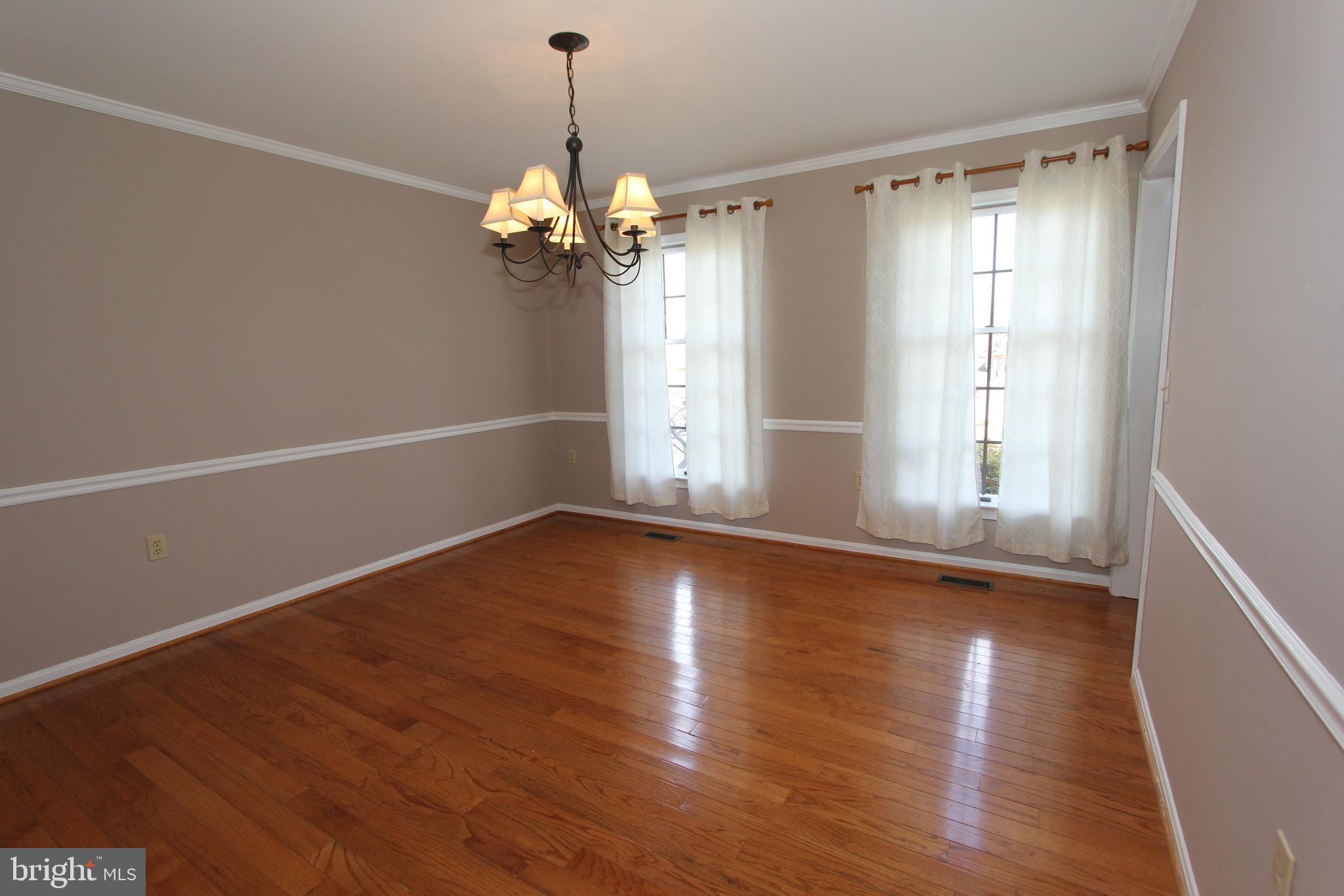 8100 Laurel Ridge Road Frederick, MD 21702 - Photo 16 of 53 Formal dining room with custom mouldings