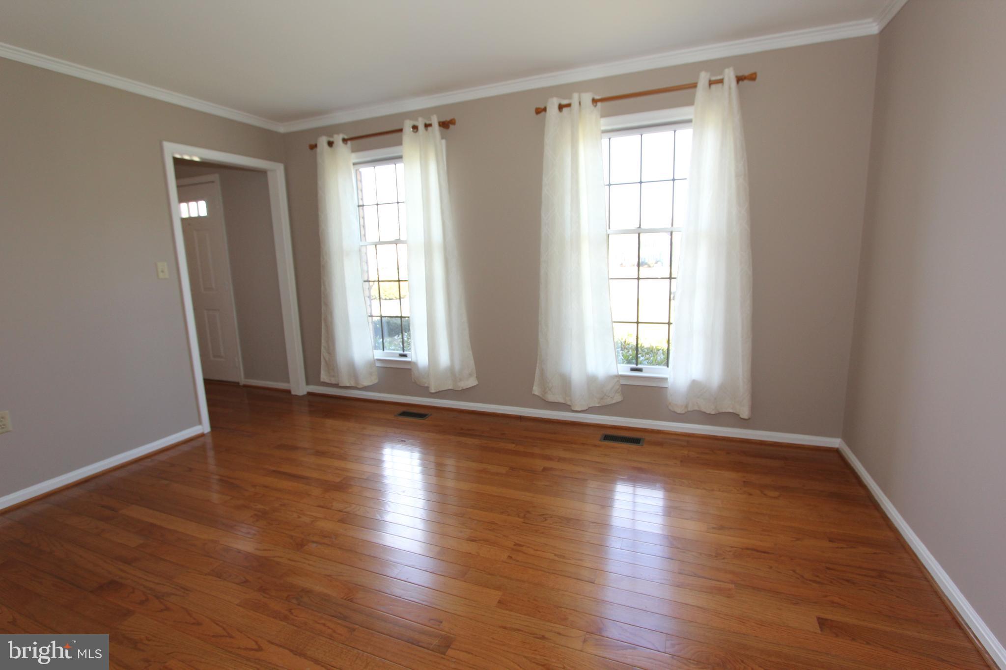 8100 Laurel Ridge Road Frederick, MD 21702 - Photo 18 of 53 Formal living room with beautiful hardwoods
